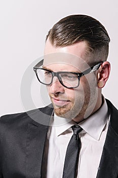 Cool young man with glasses photo