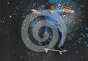 Cool young skateboarder doing an ollie trick photo