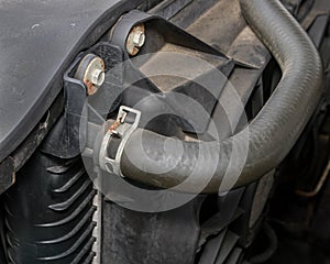 Cooling system radiator hose on car engine.