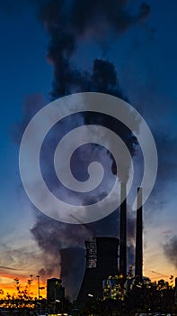 Cooling towers and chimneys of a petrochemical plant