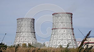 Cooling towers of CHP or thermoelectric power station. Concept of ecology, environmental protection.