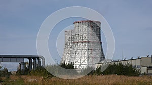 Cooling towers of CHP or thermoelectric power station. Concept of ecology, environmental protection.