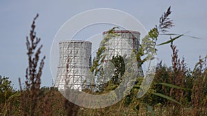 Cooling towers of CHP or thermoelectric power station. Concept of ecology, environmental protection.