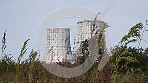 Cooling towers of CHP or thermoelectric power station. Concept of ecology, environmental protection.
