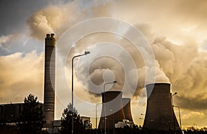 Cooling towers factory industrial spewing pollution and water vapour