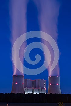 Cooling towers of a lignite-fired power plant at night
