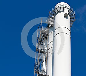 Cooling towers of nuclear power plant against the blue sky