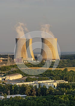 Cooling towers of Nuclear power plant Mochovce during the golden hour time.