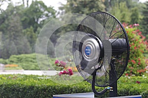 Cooling ventilator with water spray