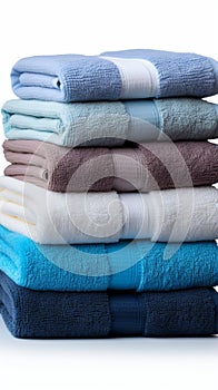 Coordinated comfort Stacked towels in blue, white, and gray showcase elegance