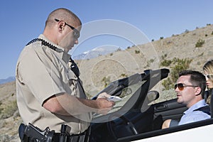 Cop Checking Man's License