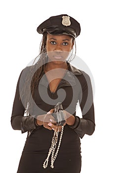 Cop woman with gun cuffs look serious