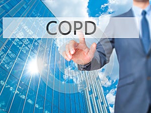 COPD - Businessman hand touch button on virtual screen interfa