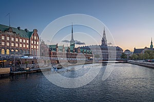 Copenhagen Canal Skyline and Slotsholmen with Borsen and Christianborg at sunset - Copenhagen, Denmark