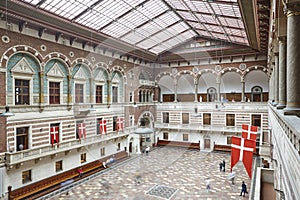 Copenhagen city hall building interior with flags. Radhus town hall