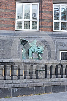 Copenhagen City Hall, green mascaron at the entrance to the building, Copenhagen, Denmark
