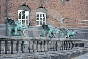Copenhagen City Hall, green mascarons at the entrance to the building, Copenhagen, Denmark