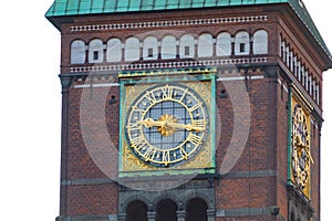 Copenhagen City Hall tower clock at evening