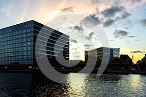 Copenhagen. Denmark. 12. September. 2021. Beautiful modern glass buildings on the bank of the canal in Copenhagen, on