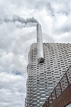 Copenhagen. Denmark. 14. September. 2021. Bottom view, of Amager Bakke factory with a big pipe, and with skiing slope on the