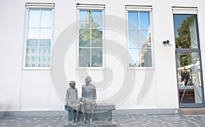 Copenhagen, Denmark - August 25, 2014 - A old couple statue in downtown square, Copenhagen, Denmark.