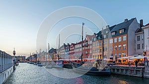 Copenhagen Denmark day to night time lapse at Nyhavn harbour