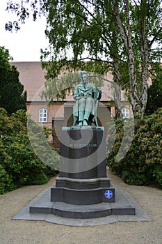 Copenhagen, Denmark - July 2021: SÃÂ¸ren Kierkegaard statue at The Royal Library Garden
