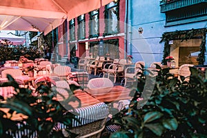 Copenhagen / Denmark - November 2019: Closed restaurant terrace near Nyhavn canal in Copenhagen. No people around. Cozy evening