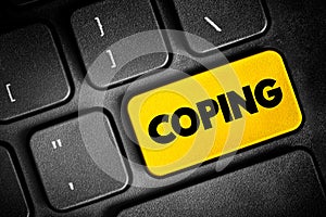 Coping - refers to conscious strategies used to reduce unpleasant emotions, text button on keyboard, concept background