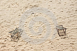 Cople wood chairs on the beach.
