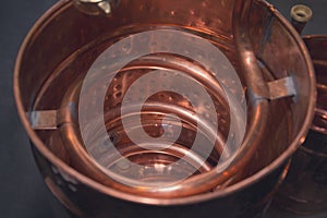 Copper alcohol mashine close up