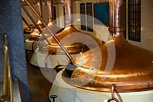 Copper beer tanks in brewhouse