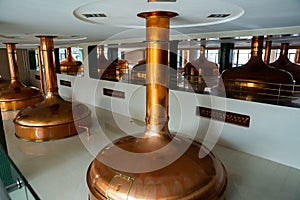 Copper beer tanks in brewhouse