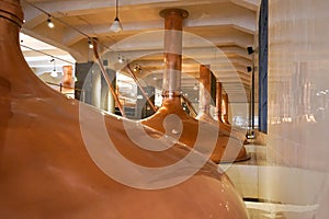 Copper boilers for brewing beer.