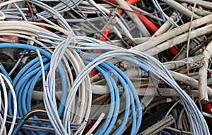 Copper cables with plastic insulation in the dump of polluting a