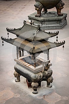Copper censer in a Buddhist Temple - Jing An Tranquility Temple - Shanghai, China
