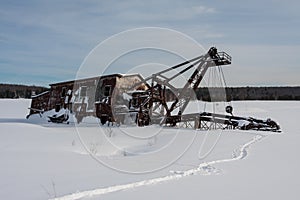 Copper Dredge Embedded in Snow and Ice