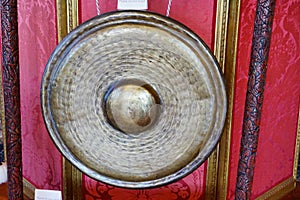 A copper gong in a mansion