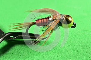 Copper John trout fly imitation photo