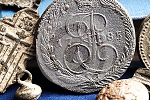 Copper 5 kopecks of Russia in 1785, around the coin are other antique items, still life for a collector
