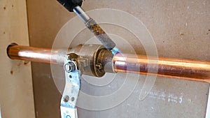 copper pipe soldering process with tin by specialized technicians