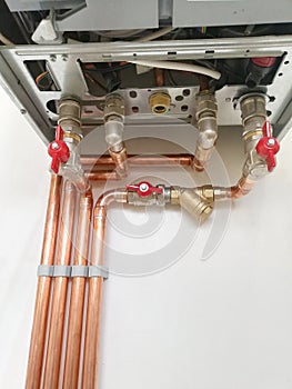 Copper pipes engineering in boiler-room. Heating system with copper pipes
