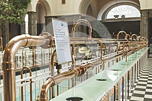 The copper pipes for mineral waters in the Fountain Hall of the Wandelhalle in Bad Kissingen, Germany