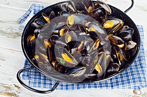 Copper pot of steamed mussels.