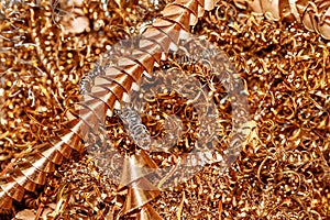 Copper shavings. Copper processing on CNC machines in production.