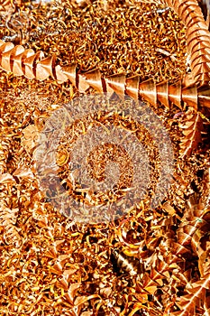 Copper shavings. Copper processing on CNC machines in production.