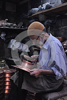 Copper smith at work