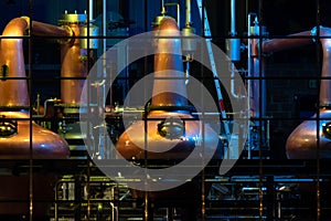 Copper stills for the production of irish Whiskey seen from the public aquare in Ardara, County Donegal - Ireland