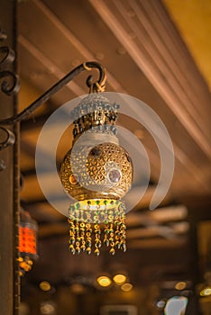 Copper lanterns on a limstone wall