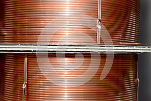 Copper tubes are wound on large coils